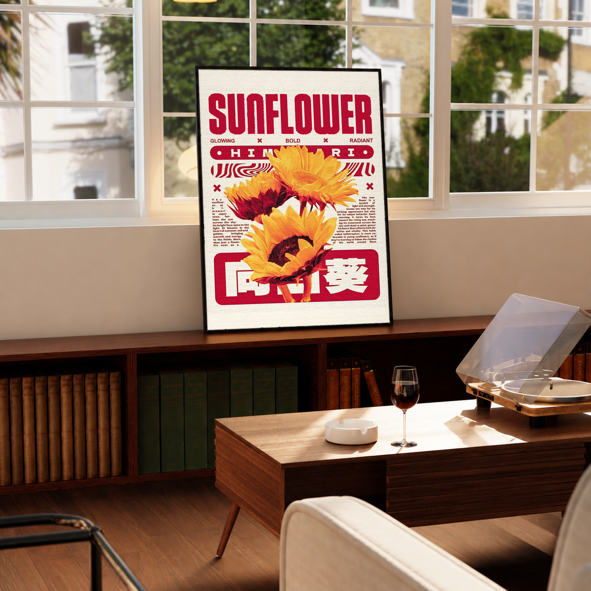 Framed sunflower poster standing on a table, featuring yellow blooms and red graphic text.