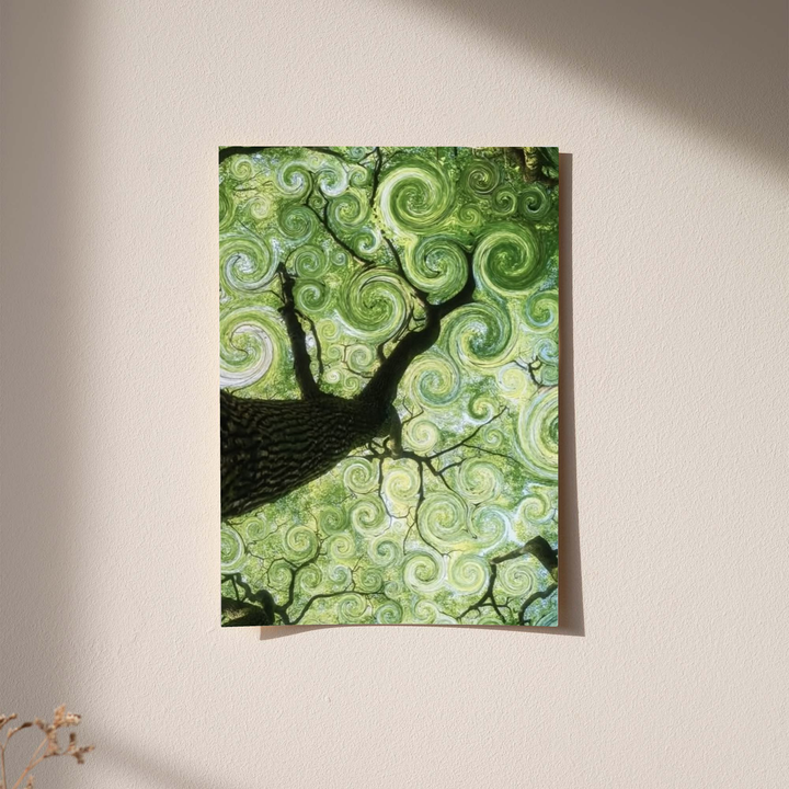 Swirling green tree canopy as an unframed print against a pale plaster wall with soft shadows