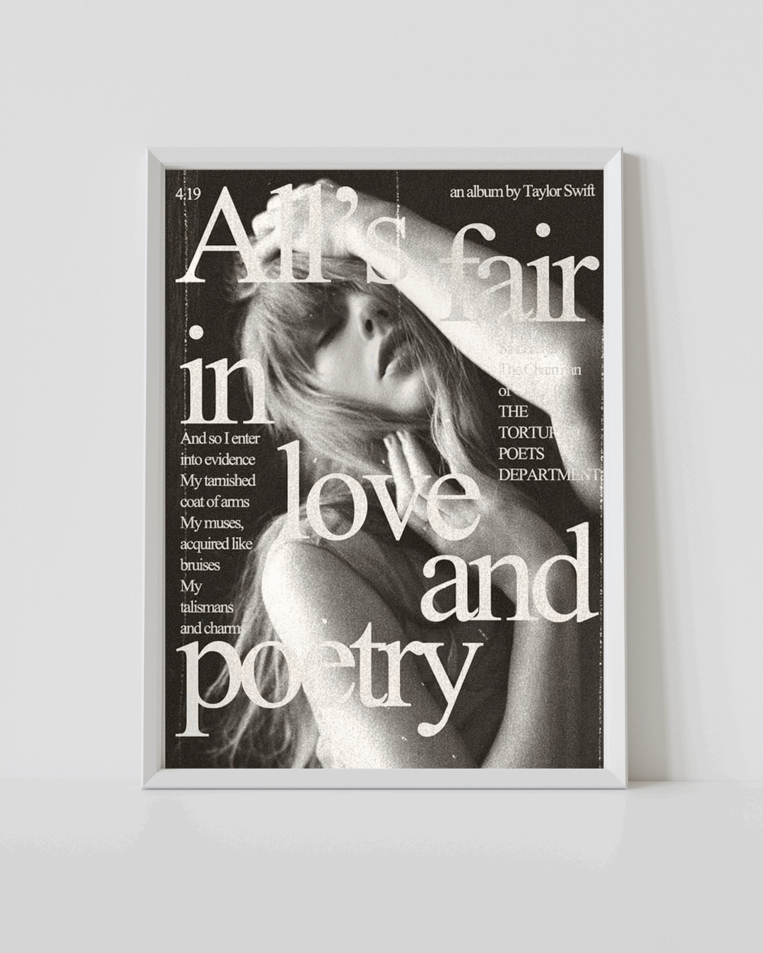 Framed wall art poster with monochrome portrait and large text reading “All’s fair love and poetry”