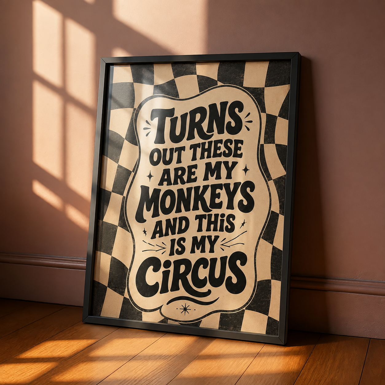 Framed wall art with black frame, checkered border, and quote text on beige