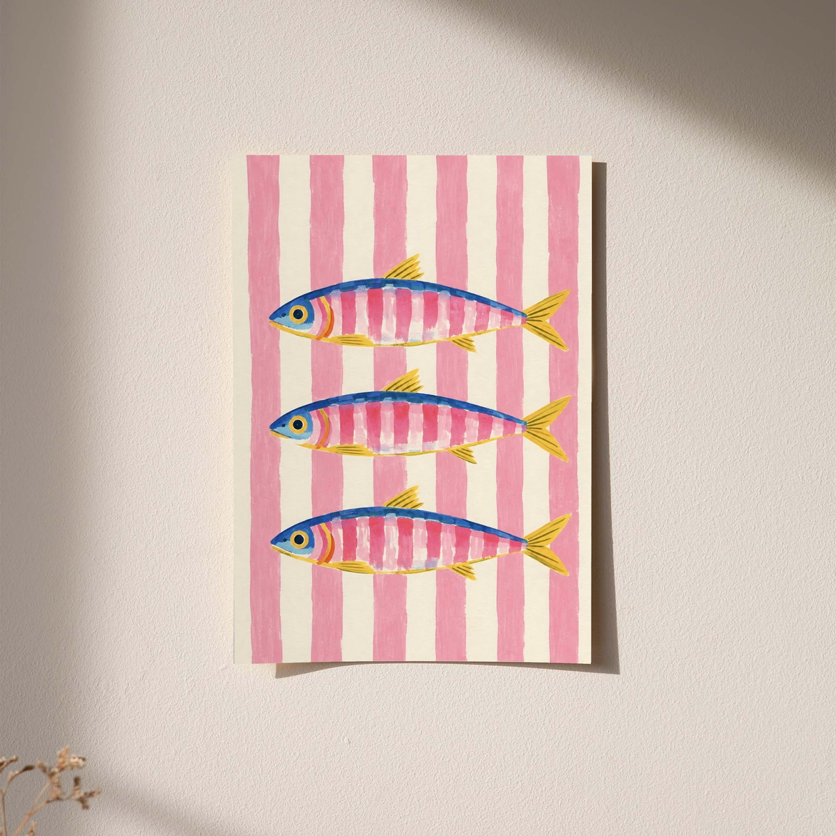 Art print showing three colorful fish on pink vertical stripes