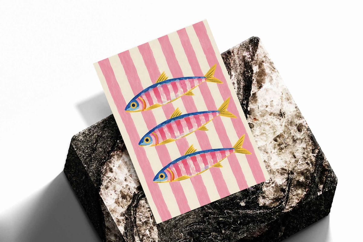 Art print with three colorful fish on pink vertical stripes