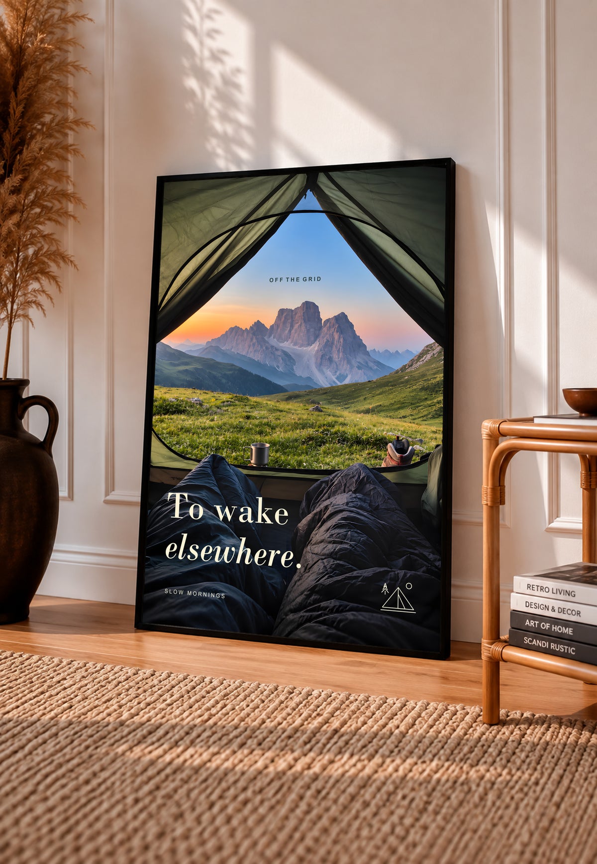 Camping poster showing a tent opening onto green hills and mountain peaks.