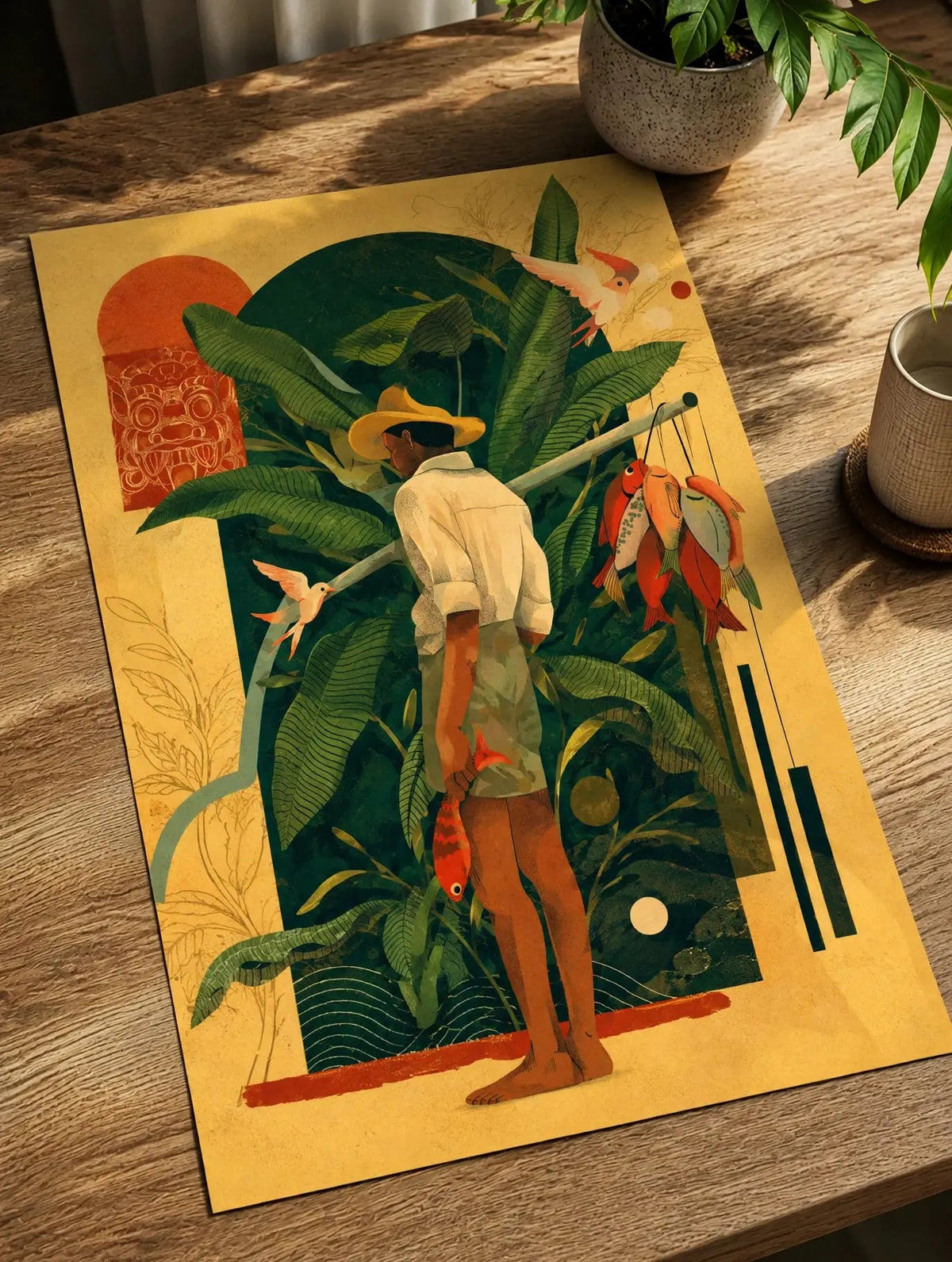 Unframed tropical figure art print on wooden table with green leaves and hanging fruit