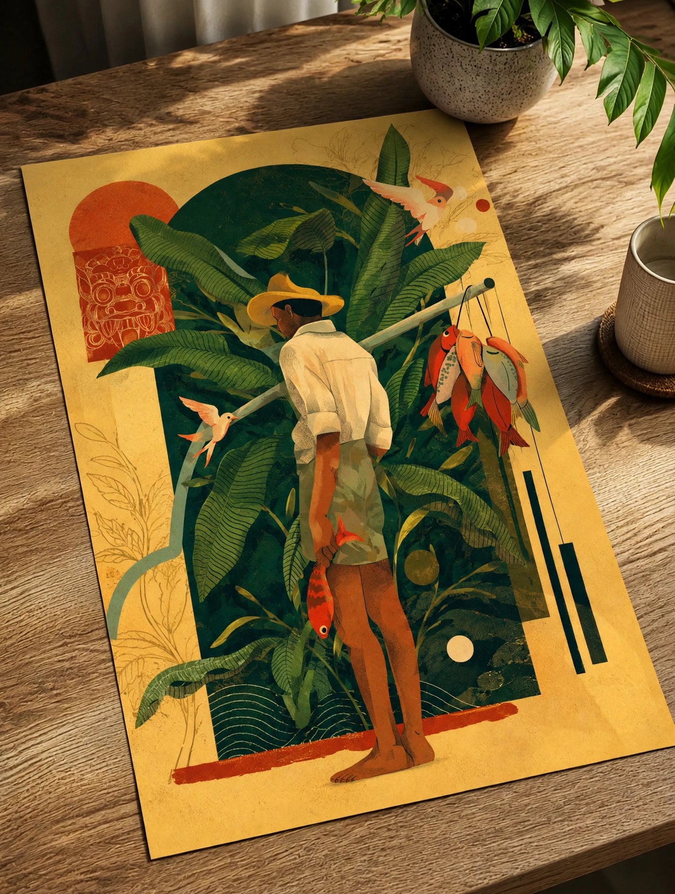 Unframed tropical figure art print on wooden table with green leaves and hanging fruit