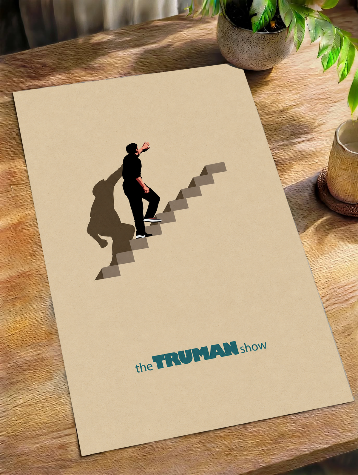 Unframed staircase poster with lone figure on steps, beige print on wooden table