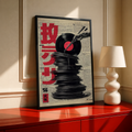 Framed wall poster with red Japanese text, black vinyl record and chopsticks graphic