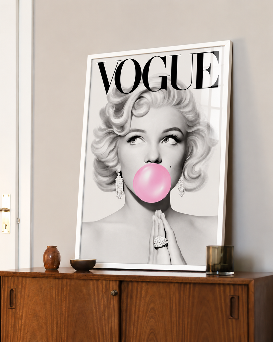 Framed Vogue pop art wall poster with wavy-haired woman and pink bubble gum on white background