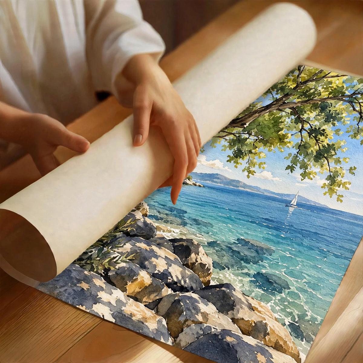 Mediterranean Coast Watercolor Art Print partially rolled to reveal painterly turquoise water, rugged rocks and overhanging branches
