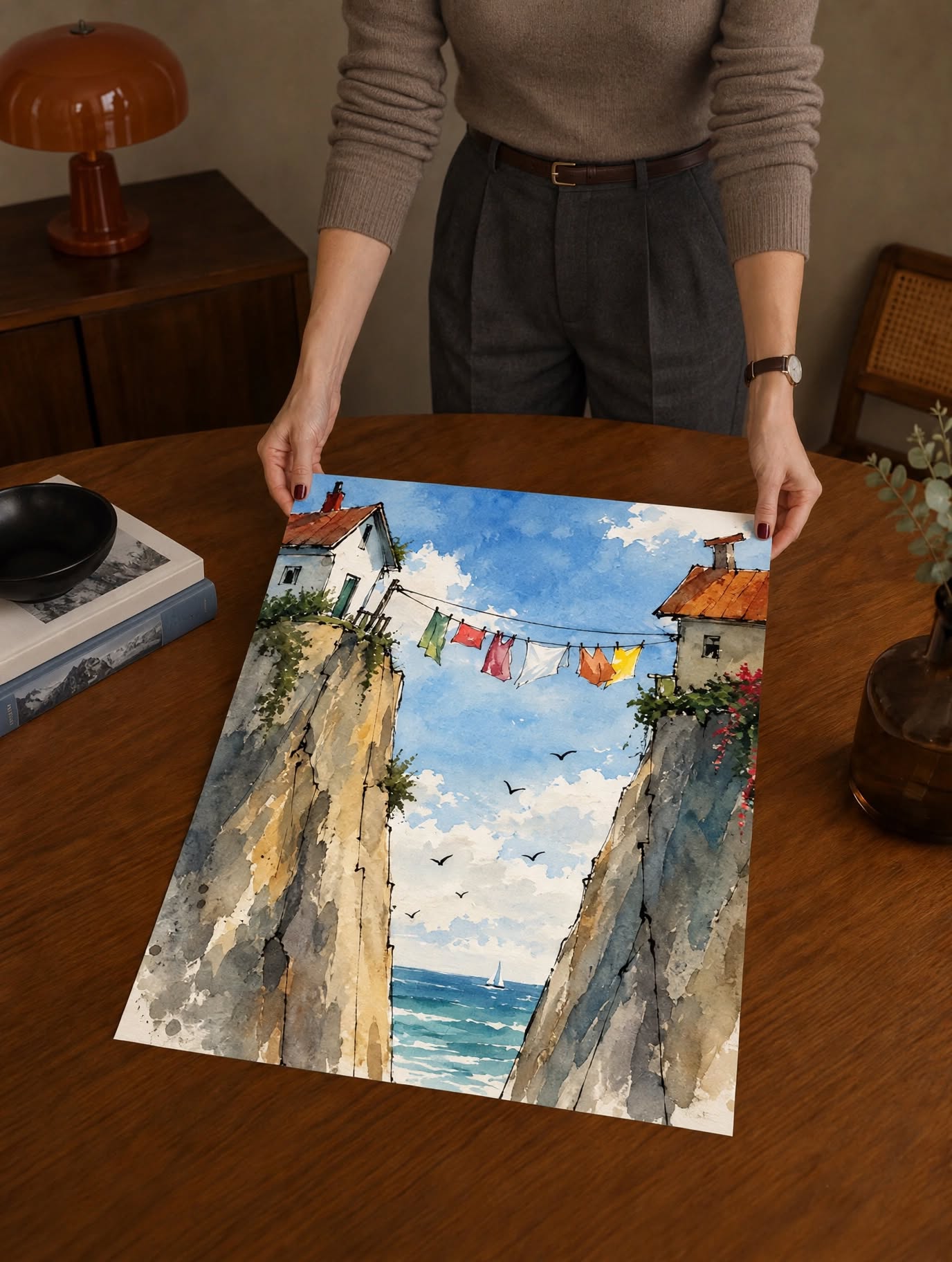 Mediterranean Street Watercolor Art Print placed on a dark wooden table, highlighting the narrow alley and loose painterly brushwork
