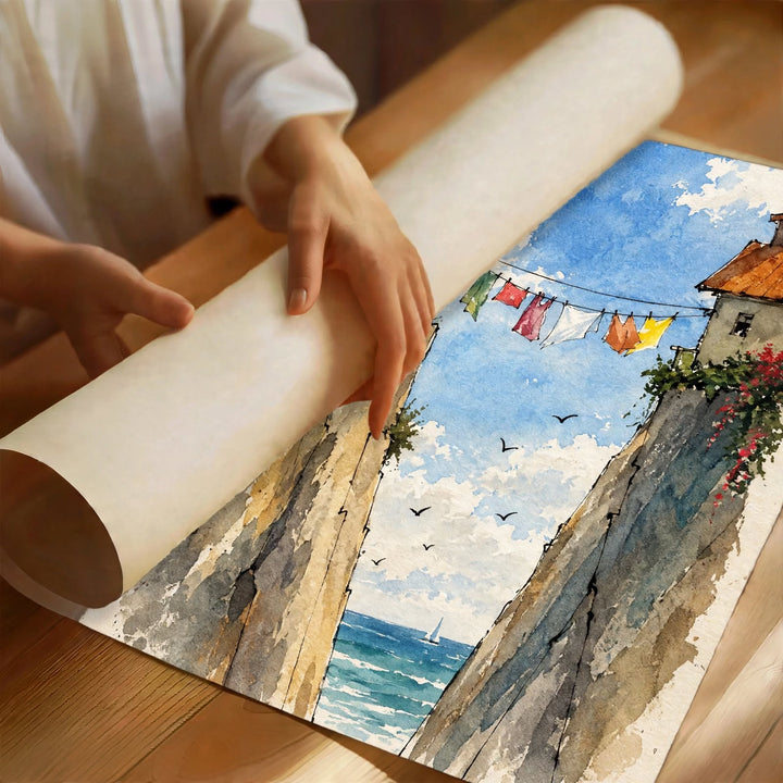 Mediterranean Street Watercolor Art Print partially rolled to reveal layered blue washes, rustic architecture and Mediterranean details