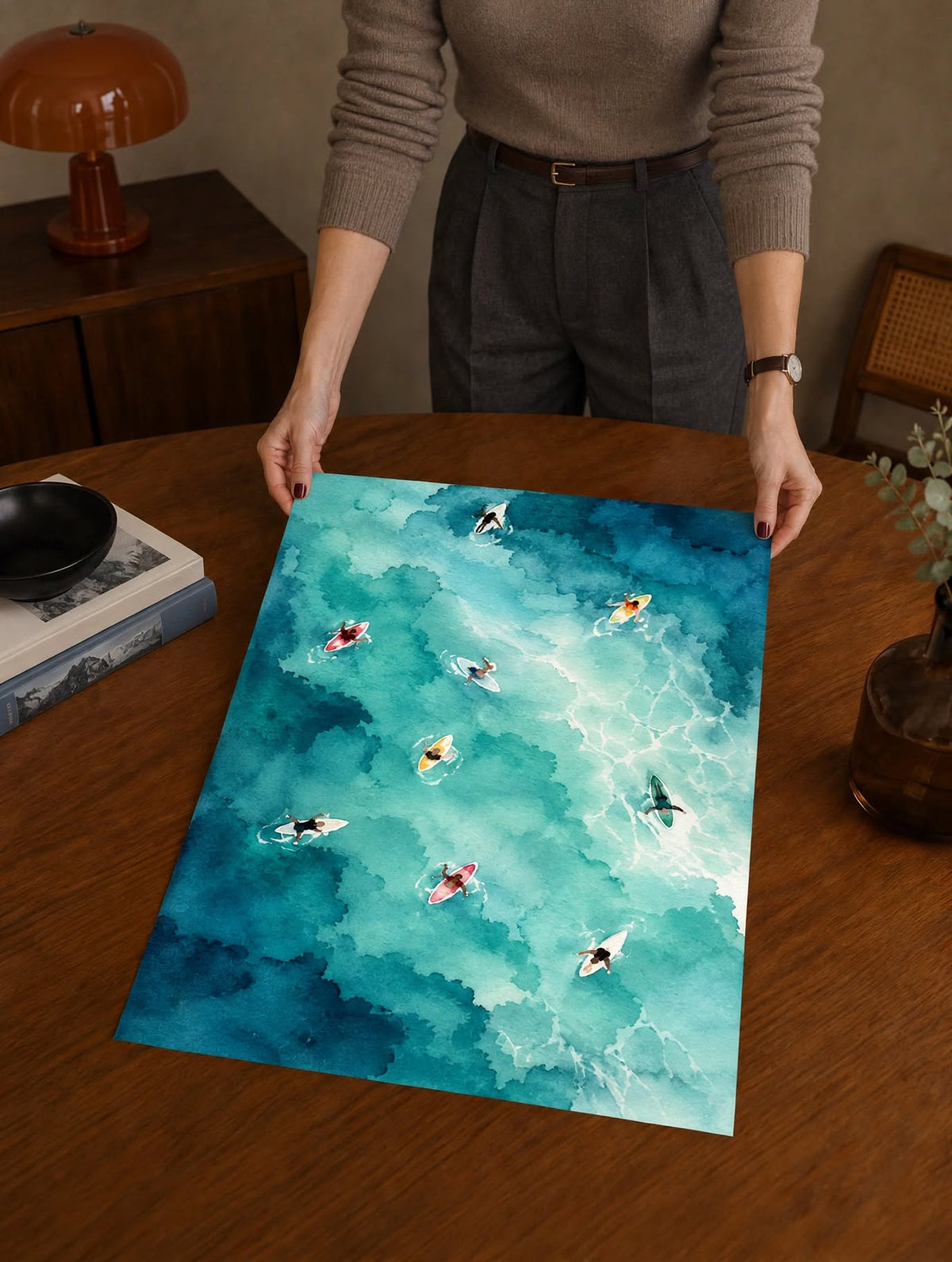 Turquoise Watercolor Pool Art Print laid flat on a dark wooden table with layered turquoise watercolor textures