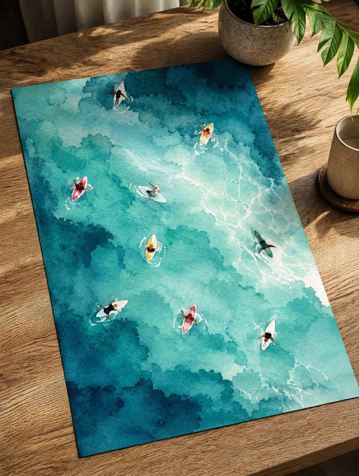 Turquoise Watercolor Pool Art Print photographed flat on a wooden surface to highlight the painterly water textures and aerial details