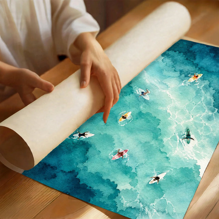 Turquoise Watercolor Pool Art Print partially rolled to reveal flowing blue water and small swimmers viewed from above