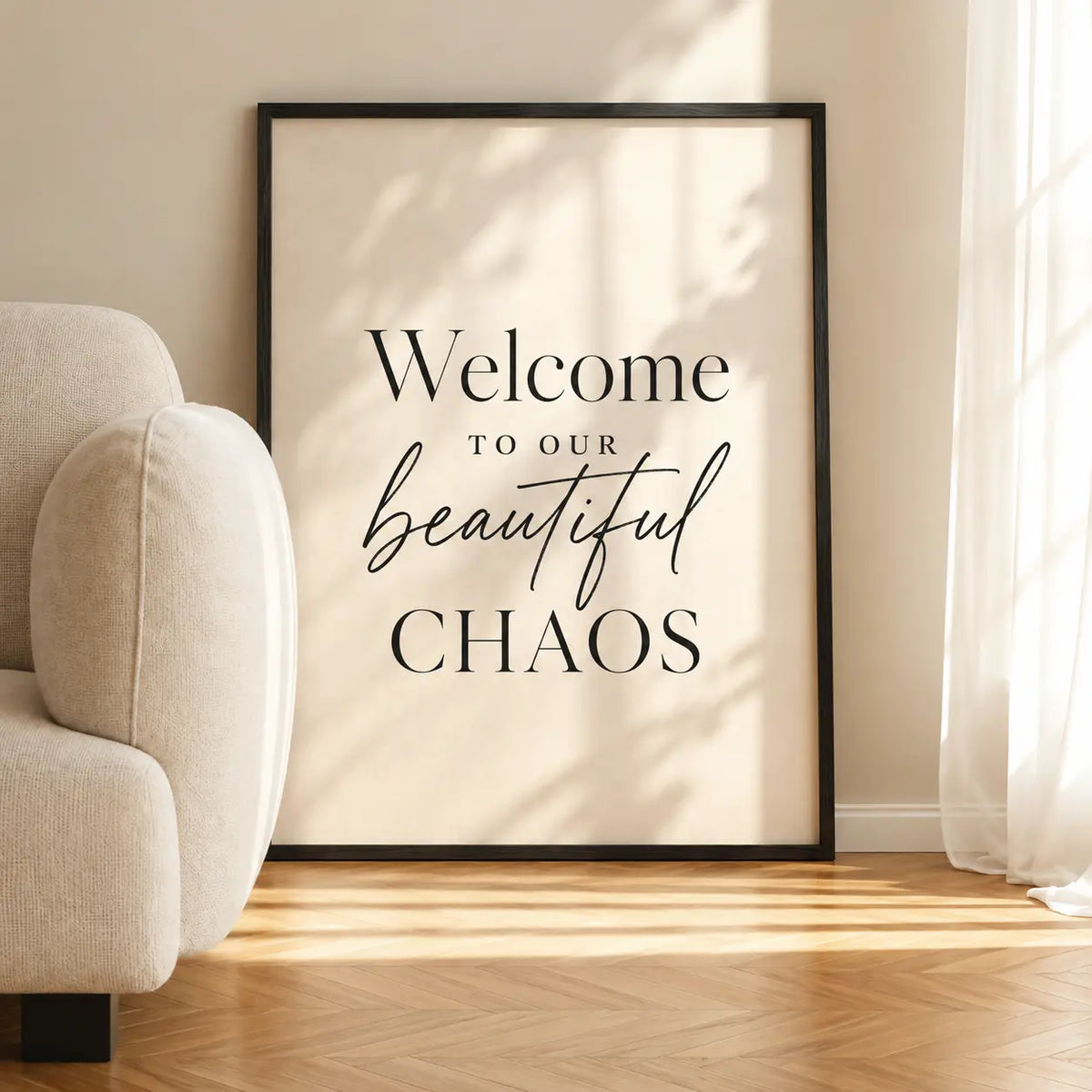 Portrait framed wall art with bold 'Welcome to our beautiful CHAOS' lettering, black frame
