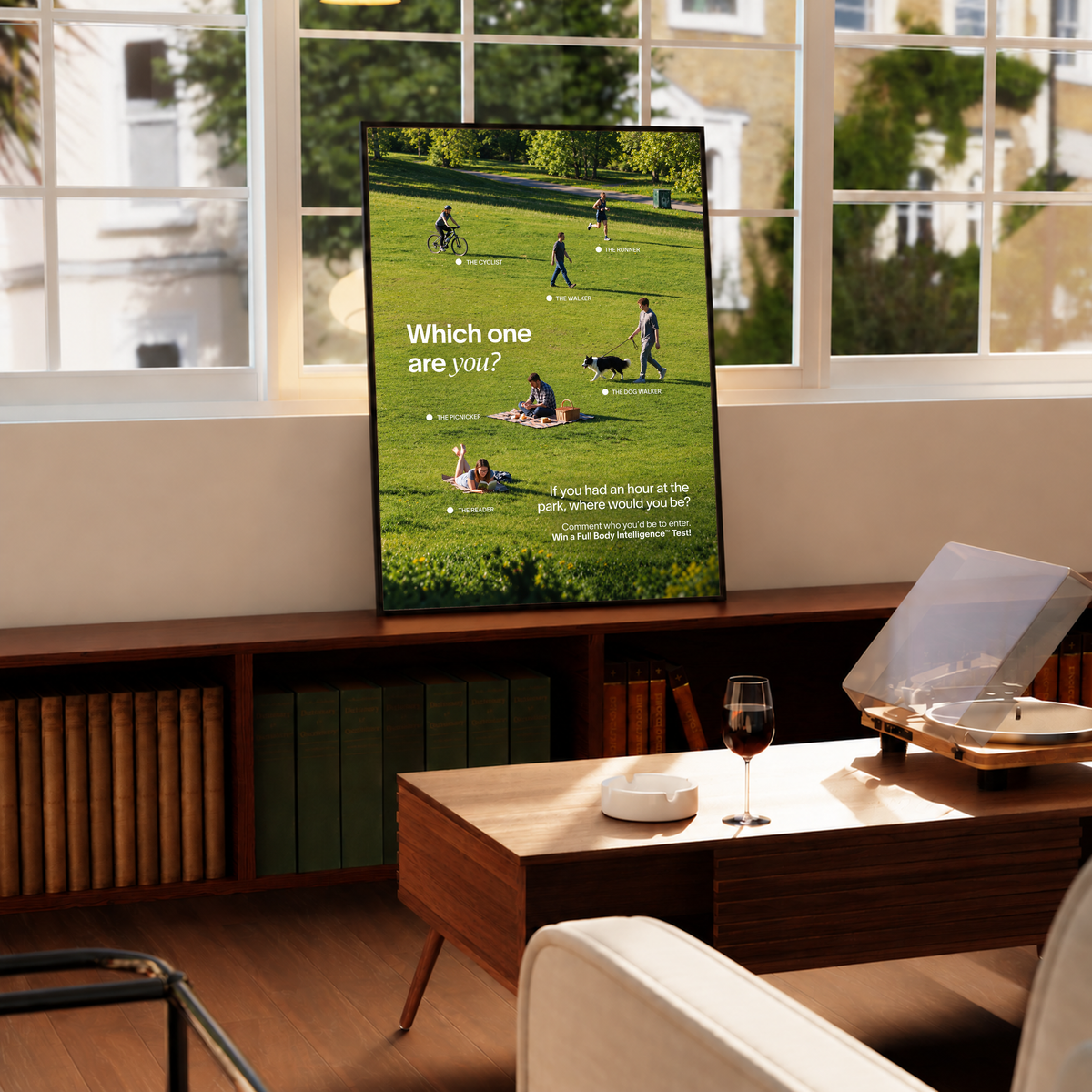 Six park activities labelled across a green lawn beneath Which One Are You text in a black frame by a bright window above a record player