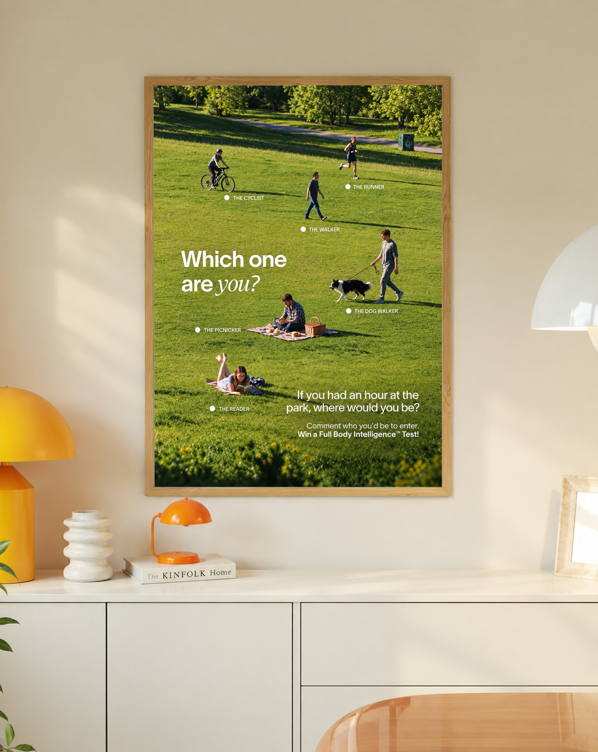 Six park activities labelled across a green lawn beneath Which One Are You text in a slim oak frame on a cream wall above a white cabinet