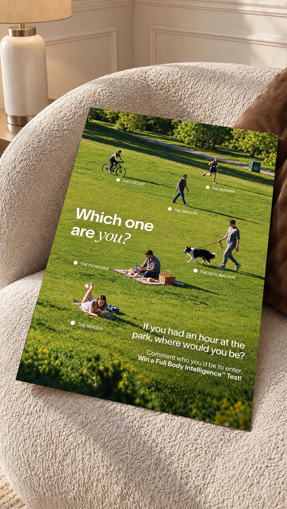 Six park activities labelled across a green lawn beneath Which One Are You text as an unframed poster resting on a cream woven chair