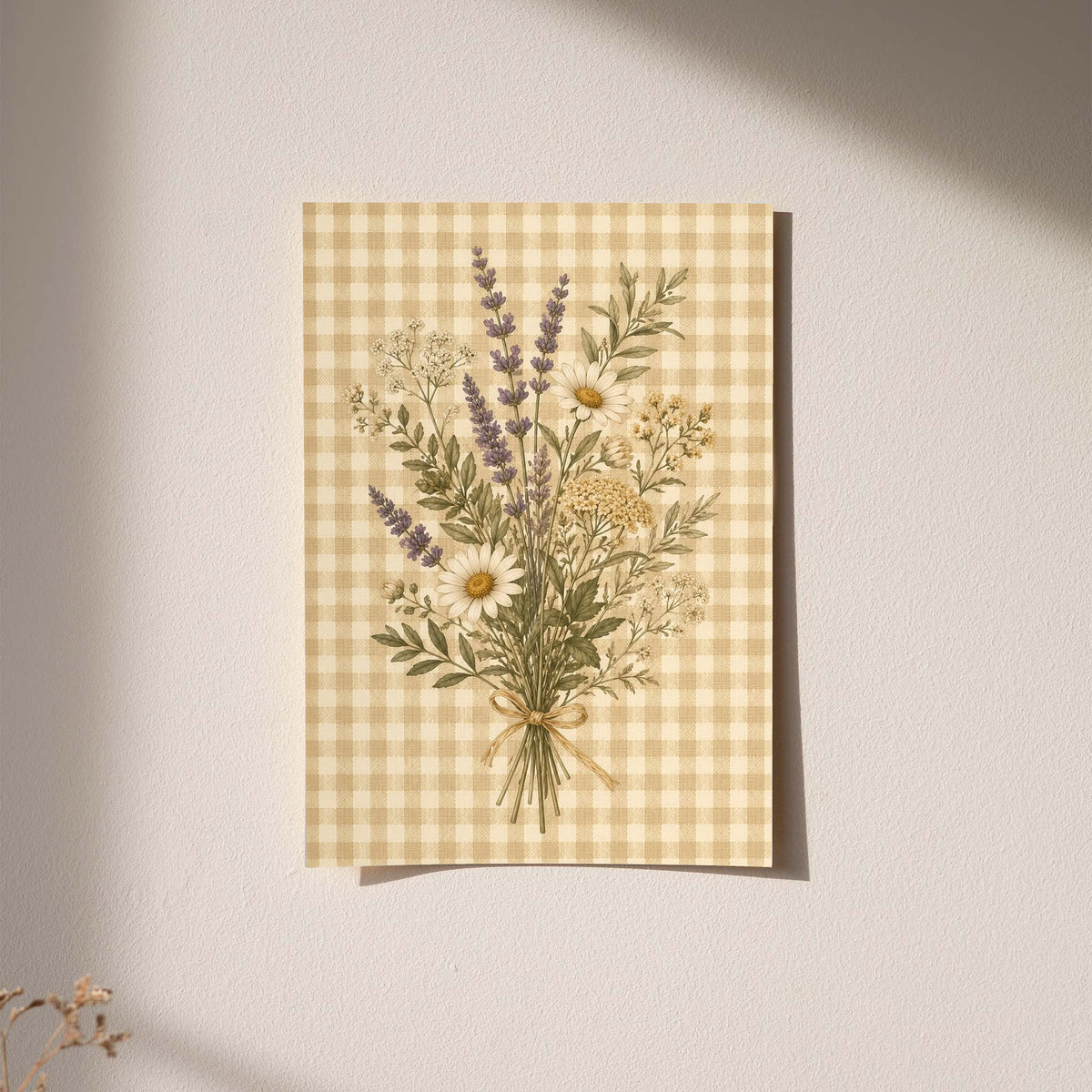 Tied bouquet of daisies lavender toned sprigs and white wildflowers on beige gingham as an unframed hanging paper print against a plaster wall