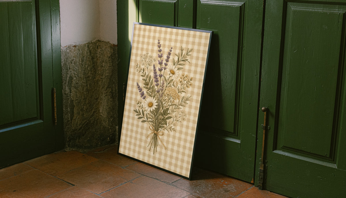 Tied bouquet of daisies lavender toned sprigs and white wildflowers on beige gingham as an unframed print leaning against a green panelled door