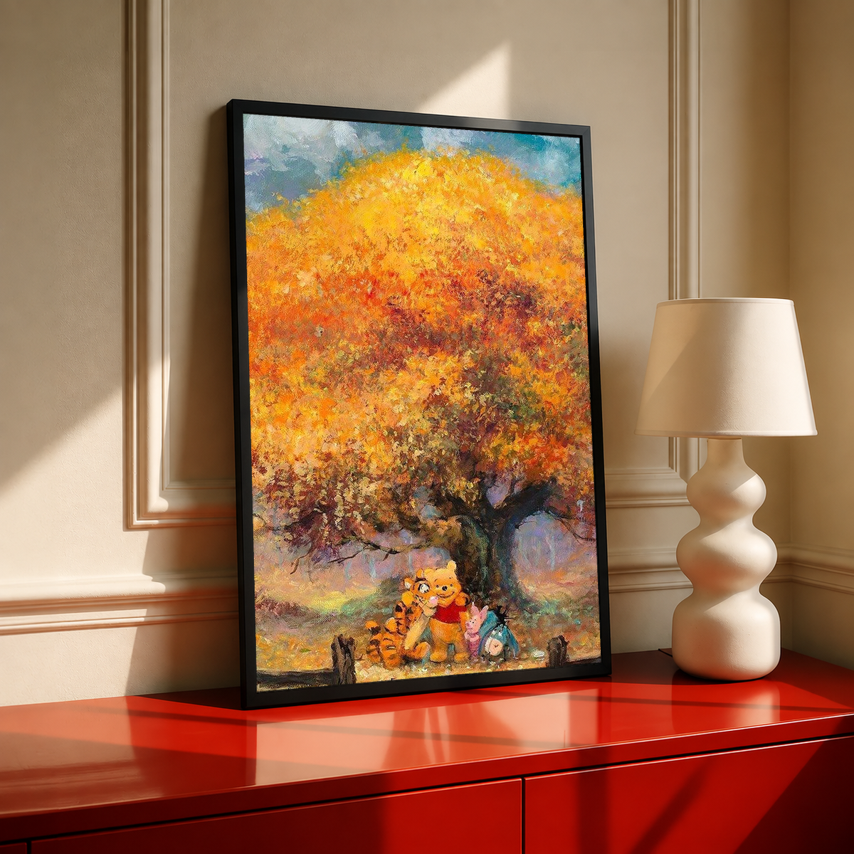 Framed autumn tree art print with golden leaves and Pooh & friends on red console