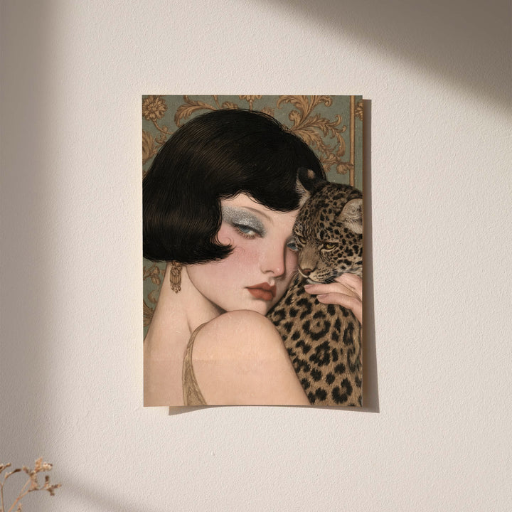 Framed portrait wall art with dark frame of a pale woman holding a leopard