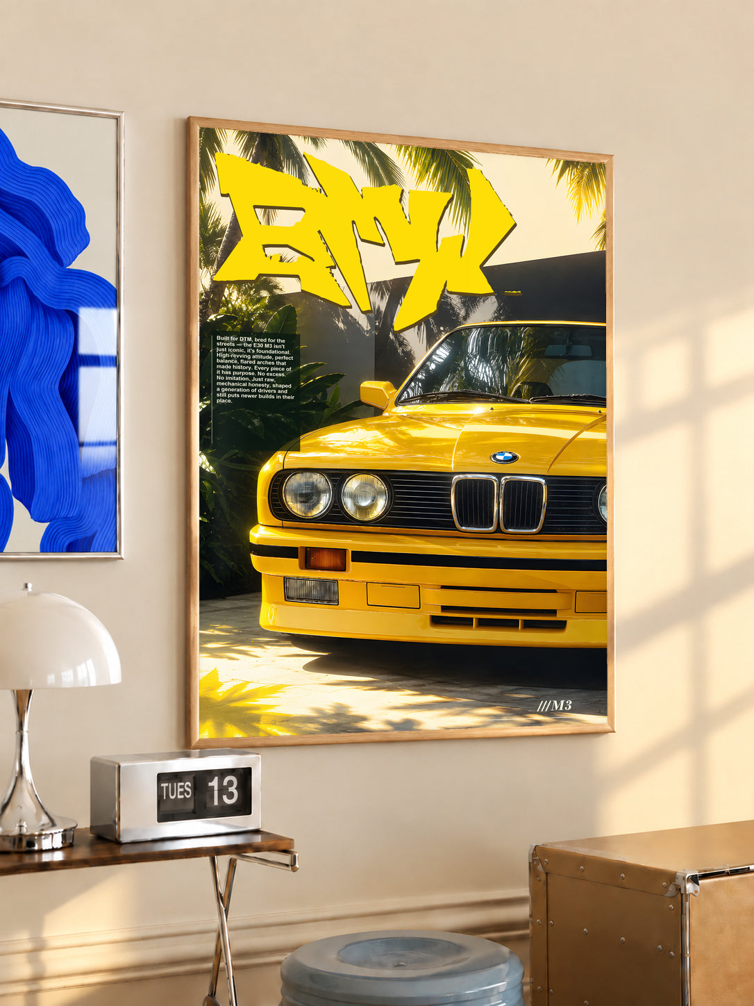 Yellow BMW M3 poster with graffiti lettering and palm shadows in an oak frame