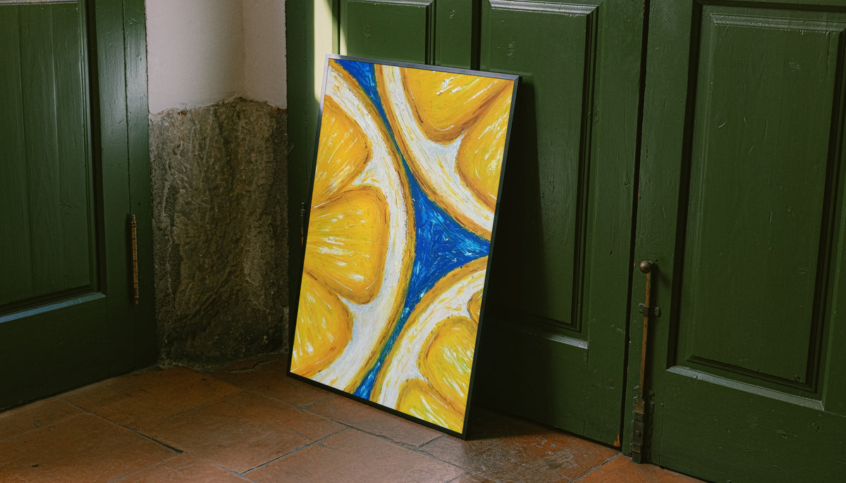 Oversized yellow lemon slices with white rinds against cobalt blue leaning on the floor against dark green wall panelling