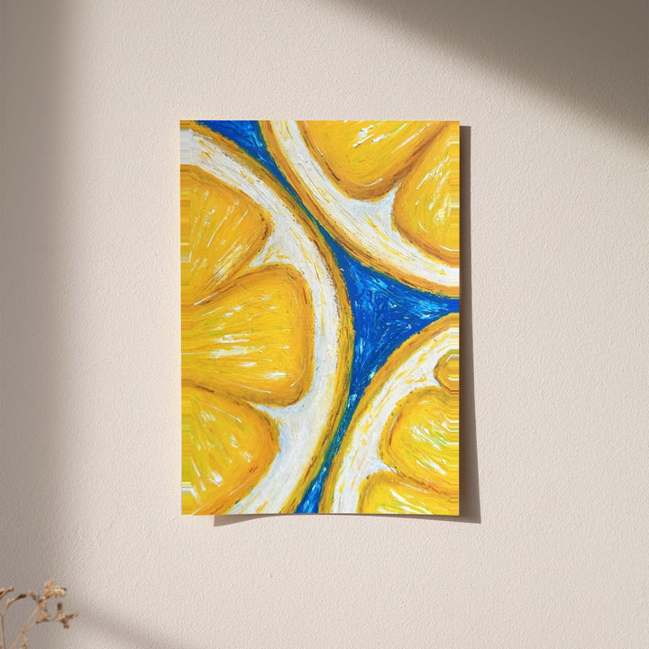 Oversized yellow lemon slices with white rinds against cobalt blue displayed without a visible frame on a softly lit pale wall