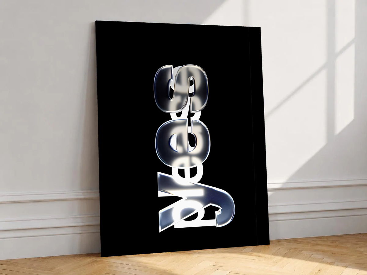 Yes Please lettering with reflective silver yes and overlapping white please on black, shown unframed on a white wall above parquet flooring with a diagonal sun shadow