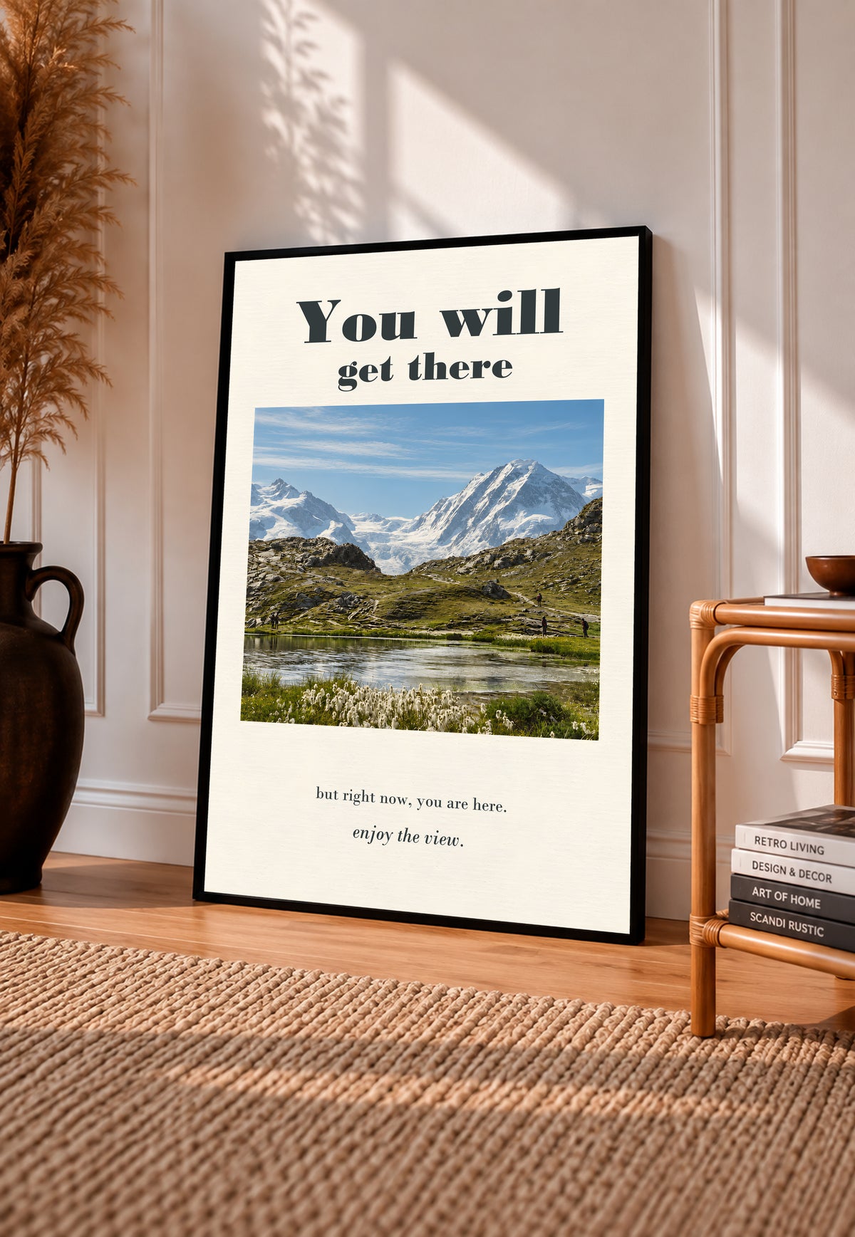 Black-framed mountain lake poster with alpine landscape and text